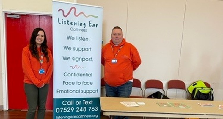 Here For Caithness - Listening Ear sign and staff