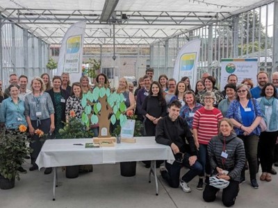 Highland Charter For Climate, Nature And Health Participants In A Greenhouse