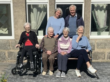 Residents And Staff In Garden At Main's House Newtonmore 2