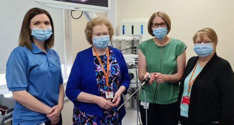 Friends of Raigmore Hospital standing with NHS Highland staff