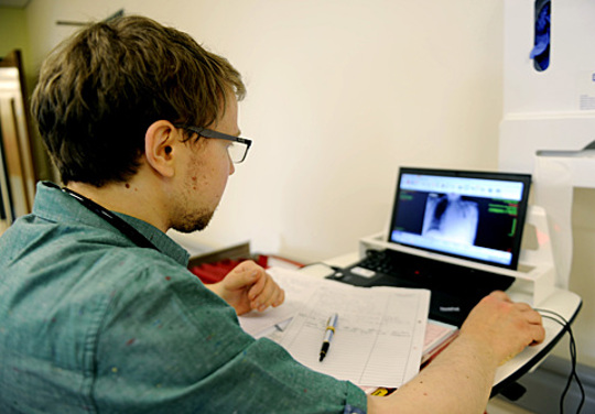 Doctor And Patient In Consulting Room