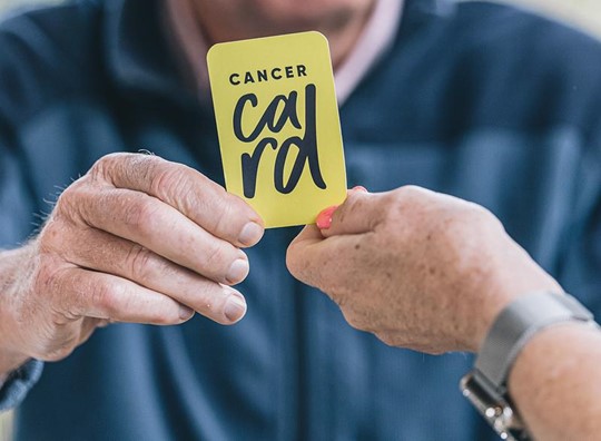 Cancer Card In Hands